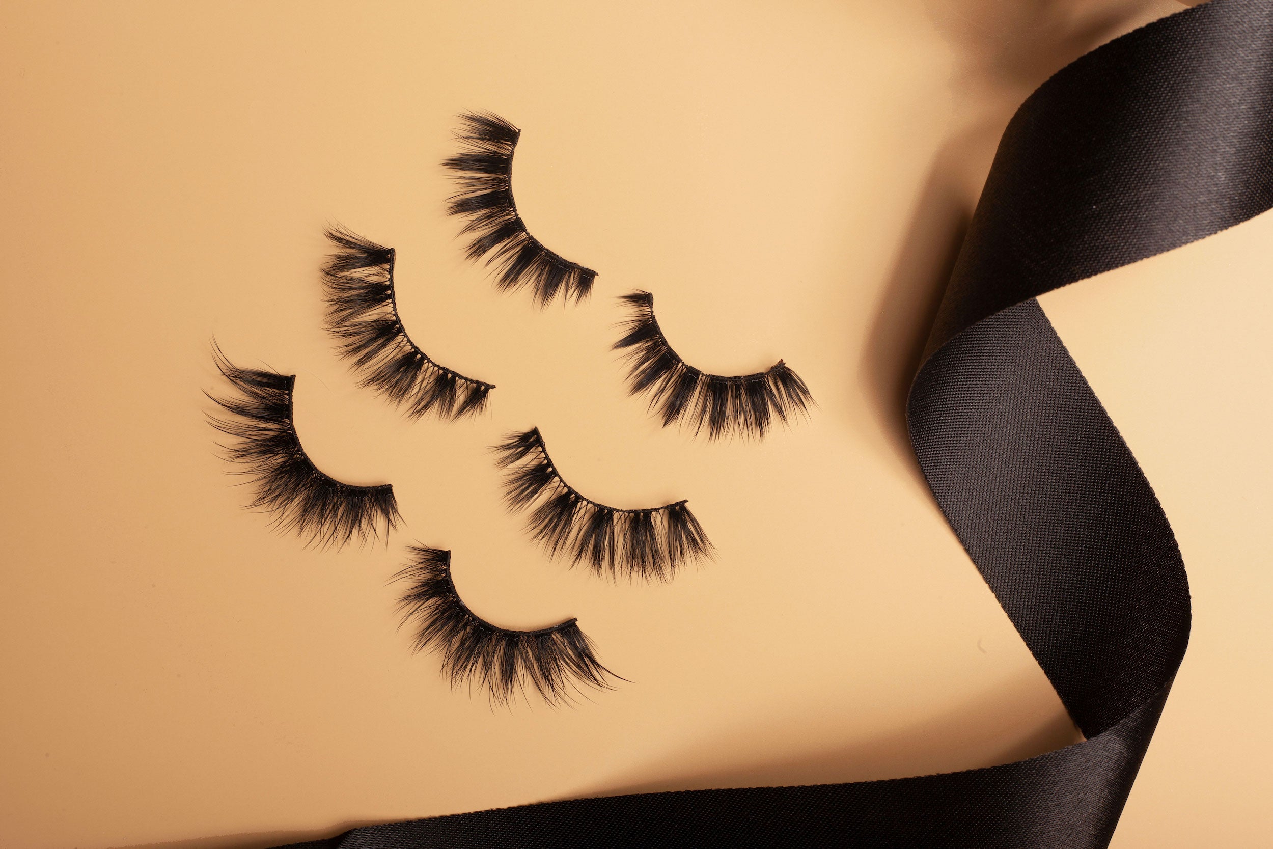 OKT Lashes. Best false eyelashes. Cat eyelashes. Best fake eyelashes. Edmonton False Eyelashes. Fake eyelashes. How to clean false eyelashes. How to apply false eyelashes. Fake eyelash storage. False eyelashes storage. Reusable false eyelashes.