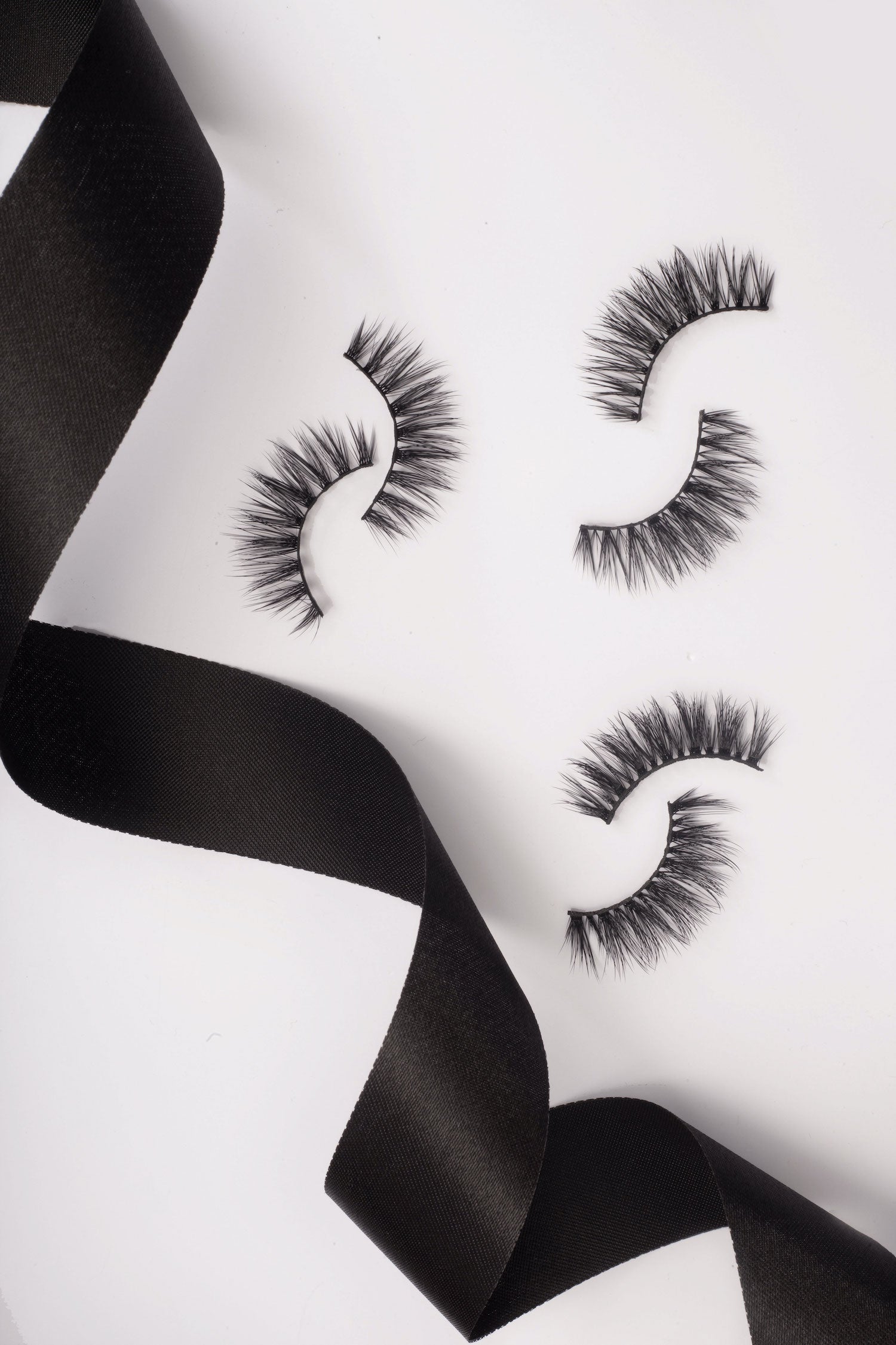 OKT Lashes. Best false eyelashes. Doll eyelashes. Best fake eyelashes. Edmonton False Eyelashes. Fake eyelashes. How to clean false eyelashes. How to apply false eyelashes. Fake eyelash storage. False eyelashes storage. Reusable false eyelashes.